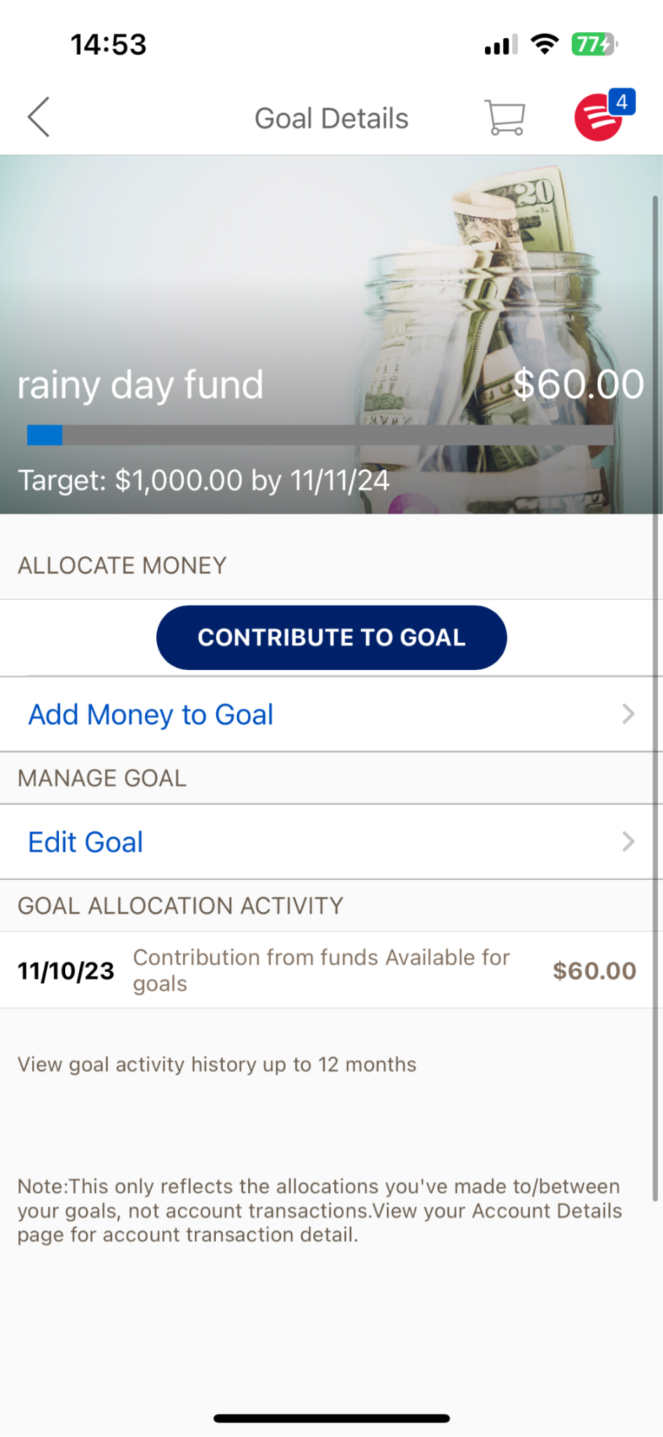 A mobile banking interface showing a Goal Details screen for a rainy day fund. The top header features a background image of a glass jar filled with dollar bills, with text showing 60.00 dollars saved out of a 1,000.00 dollar target by November 11, 2024. Below the progress bar, action options include a dark blue Contribute to Goal button, Add Money to Goal, and Edit Goal.